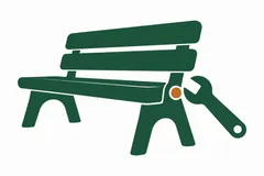 An orange bench joint inspected with a wrench