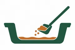 Sediment being removed from the bottom of a basin